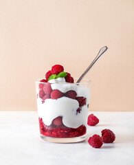 Raspberry dessert, fruit yogurt with raspberry and mint.