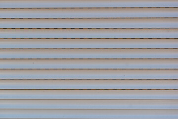 Background of blind slats in light gray color