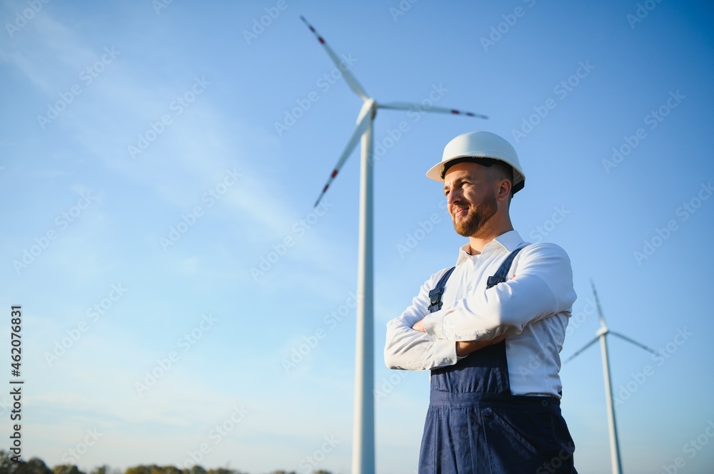 Wall mural wind turbines generating electricity. energy conservation concept.