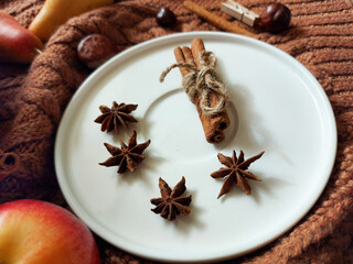 Spices on a white plate close up 