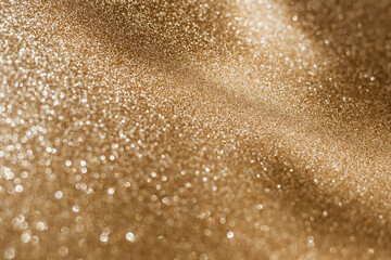 Golden glitter background with small particles