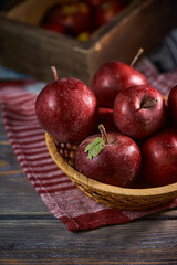 Fototapeta na wymiar Natural organic red apples on wooden background