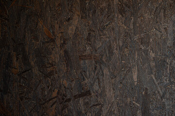 texture di diversi tipi di legno pressati che formano una parete