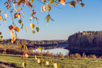 Landscape view on the bend of Daugava river and at Naujene parish, Daugavpils district, Latgale region, Latvia, which is a part of Nature Park “Daugavas Loki” at autumn - obrazy, fototapety, plakaty