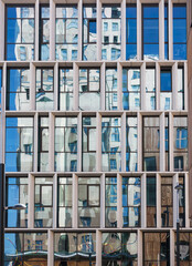 windows of a building with colorful reflections 