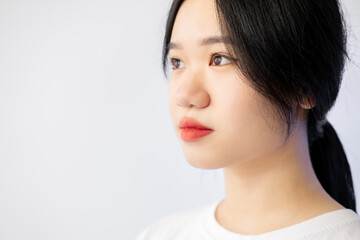 Asian skin care. Beautiful woman. Smooth treatment. Advertising background. Pretty dark haired lady...