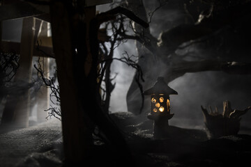 Creative artwork decoration. Abstract Japanese style wooden tunnel at night. Selective focus