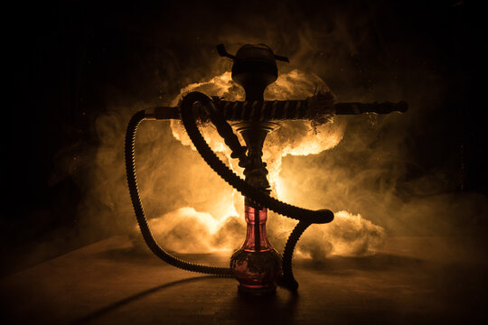 Hookah hot coals on shisha bowl with black background. Stylish oriental shisha. Shisha Concept