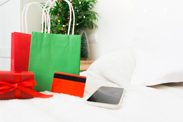 Christmas background with gift bags. Christmas sale and shopping concept