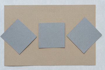 paper squares on beige paper
