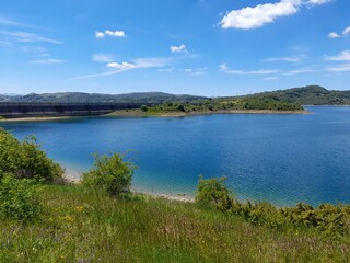 panorama of Campotosto lake called the little Tibet in a beautiful spring day. Italy
