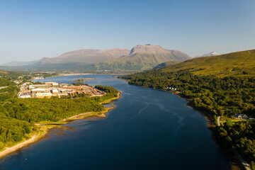 Aerial view of Ben Nevis, Fort William and Loch Eil in the evening sunshine