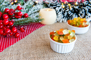 Fototapeta na wymiar Candied fruit on a Christmas table.