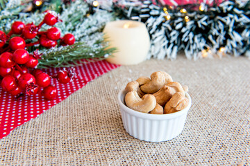 Fototapeta na wymiar Cashew nuts on a Christmas table