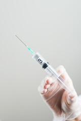 Doctor preparing a dose for a patient of the third vaccine for Covid-19