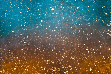 Modern futuristic abstract wallpaper. White particle ink stains, creative spray and artistic splatter. Cyan blue and rusty orange blurred background