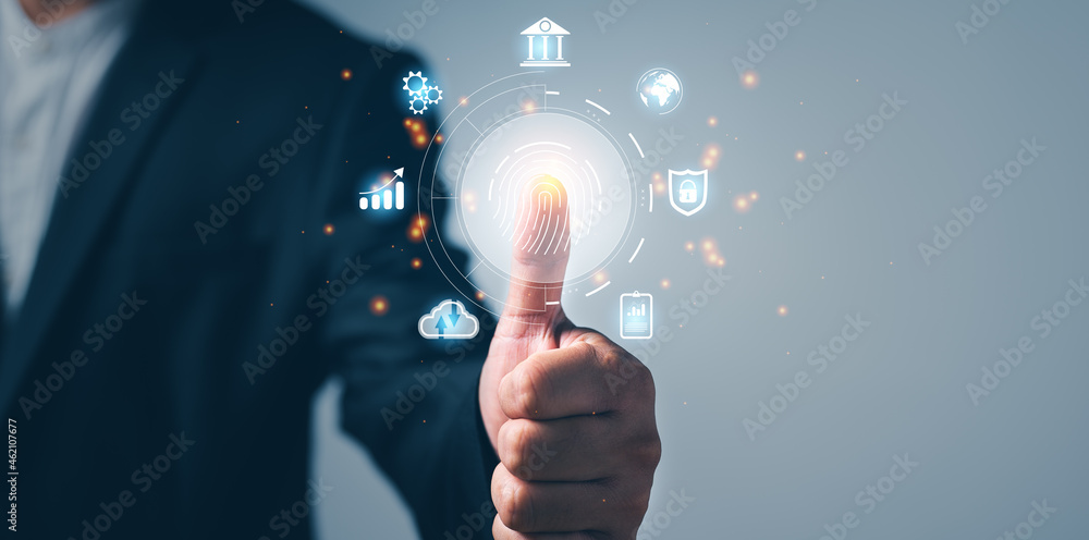 Aufkleber Man using thumb to scan finger print or for digital processing biometric identification to access security system includes internet banking, cloud system and mobile phone , Cyber security concept.