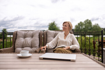 Contented lady enjoying the morning in the countryside