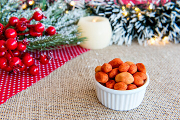 Obraz na płótnie Canvas Colorful peanuts on a Christmas table