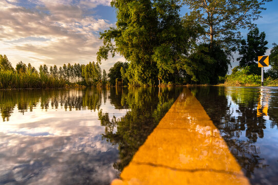 A View From A Low Vantage Point On A Flooded Road