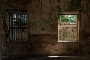 Fototapeta na wymiar Bangkok, Thailand - Feb 2, 2020 : Abandoned buildings : Within the old customs house Or Old bang rak fire station. One of more than 120 years old architecture. Old buildings, Selective focus.