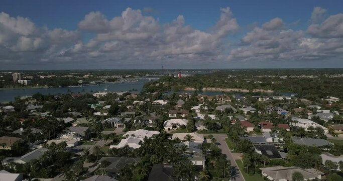 Drone Over Jupiter Inlet Colony In Jupiter, Florida Toward Lighthouse