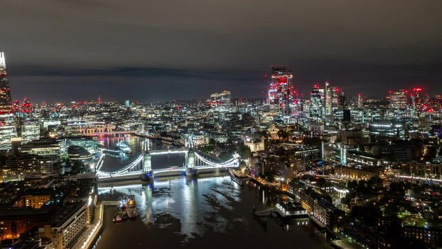 Cinematic aerial hyperlapse of London Tower Bridge at night