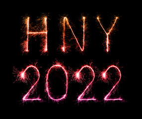2022 happy new year fireworks (HNY) written sparkling at night