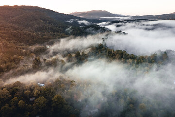 Mountains and trees at a rural village, high angle in the morning