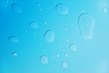 Water drops on blue background. abstract background.
