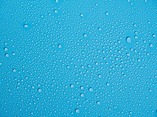 Water drops on blue background. abstract background.