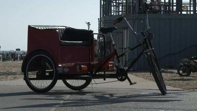 Pedicab or rickshaw on the beach path near the famous Santa Monica Pier