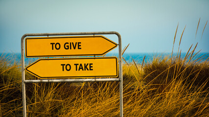 Street Sign to TO GIVE versus TO TAKE