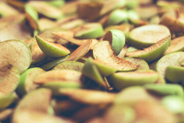 The process of home cooking dried fruits in an electric dryer.