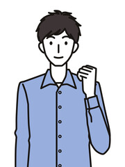 ガッツポーズの男性