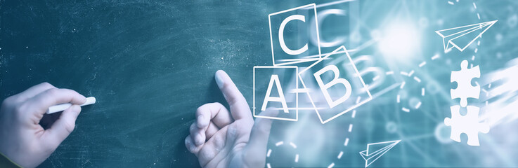 Chalkboard. Crayons for writing on a blackboard. Learning concept. School teaching chalk board.