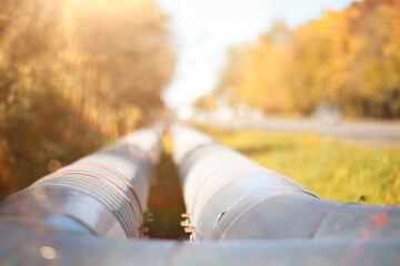 Fototapeta premium Industrial pipes on street construction