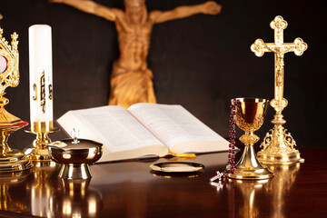 Catholic symbols composition. Religion concept. Jesus figure,The Cross, monstrance,  Holy Bible and...