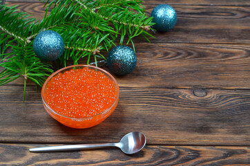 red caviar, delicious seafood on a wooden background