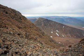 The concept of outdoor activities in the mountains. Minimalist mountain landscape. Atmospheric view. The majestic nature of the Circumpolar Urals.