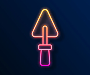 Glowing neon line Trowel icon isolated on black background. Vector