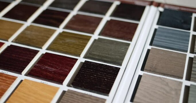 Palette with painted wood samples to select the color of wood products.
