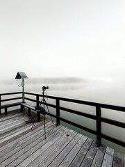 pier on the foggy beach