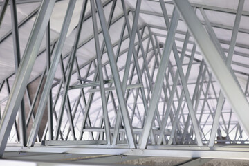 Structure of steel roof frame for building construction closeup