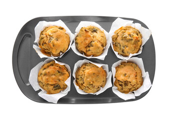 Baking tin with tasty spinach muffins on white background