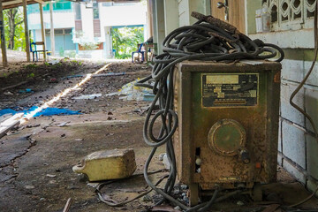 The old iron welding machine  and 
wire.