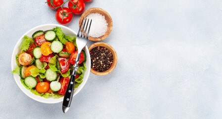 Fresh salad with tomato and cucumber