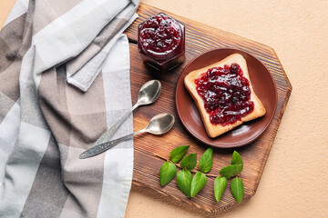 Tray with tasty toast and cranberry jam on color background, closeup