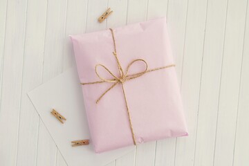 Pink gift or product package with ribbon, feminine gift mockup for Valentines day sticker, label,...