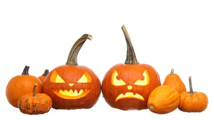 Carved pumpkins for Halloween on white background